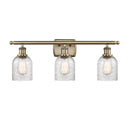 Caledonia Bath Vanity Light shown in the Antique Brass finish with a Mica shade