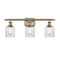 Caledonia Bath Vanity Light shown in the Antique Brass finish with a Mica shade