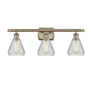 Conesus Bath Vanity Light shown in the Antique Brass finish with a Clear Crackle shade