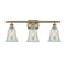 Hanover Bath Vanity Light shown in the Antique Brass finish with a Mouchette shade