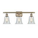 Hanover Bath Vanity Light shown in the Antique Brass finish with a Fishnet shade