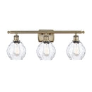 Waverly Bath Vanity Light shown in the Antique Brass finish with a Clear shade