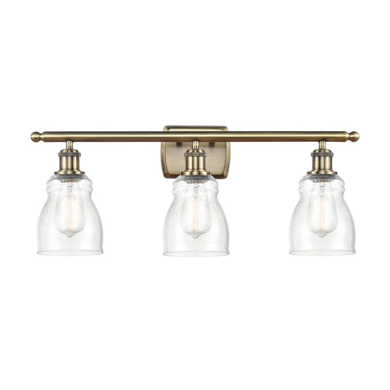 Ellery Bath Vanity Light shown in the Antique Brass finish with a Seedy shade