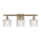 Niagra Bath Vanity Light shown in the Antique Brass finish with a Clear shade