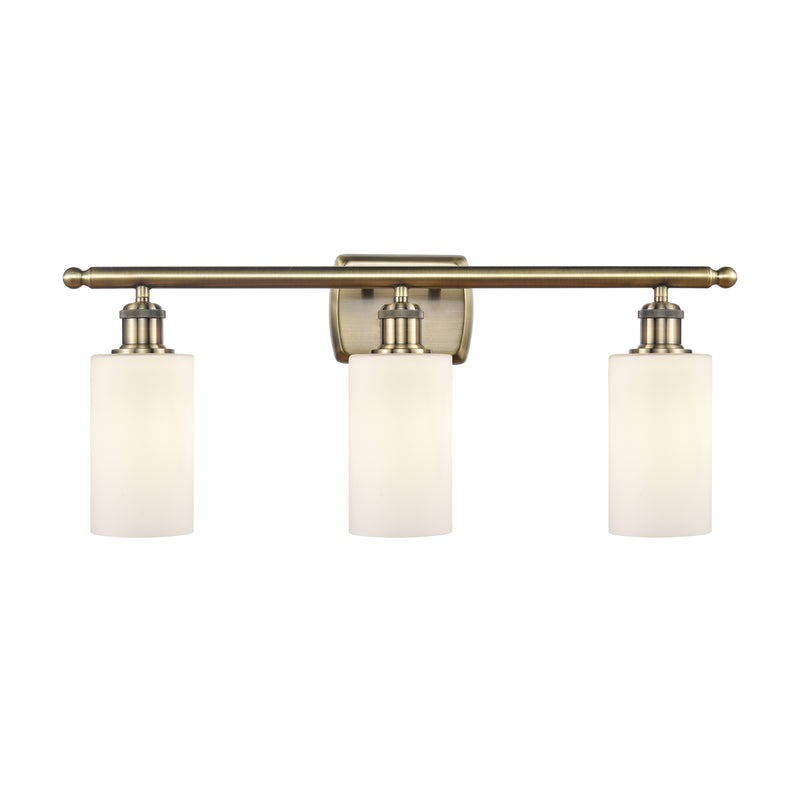 Clymer Bath Vanity Light shown in the Antique Brass finish with a Matte White shade