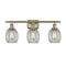 Eaton Bath Vanity Light shown in the Antique Brass finish with a Clear shade