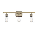 Bare Bulb Bath Vanity Light shown in the Antique Brass finish