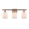 Cobbleskill Bath Vanity Light shown in the Antique Copper finish with a Matte White shade