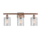 Cobbleskill Bath Vanity Light shown in the Antique Copper finish with a Clear shade