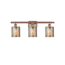 Cobbleskill Bath Vanity Light shown in the Antique Copper finish with a Mercury shade