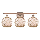 Farmhouse Rope Bath Vanity Light shown in the Antique Copper finish with a White Glass with Brown Rope shade