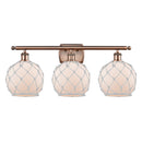 Farmhouse Rope Bath Vanity Light shown in the Antique Copper finish with a White Glass with White Rope shade