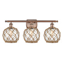 Farmhouse Rope Bath Vanity Light shown in the Antique Copper finish with a Clear Glass with Brown Rope shade