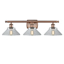 Orwell Bath Vanity Light shown in the Antique Copper finish with a Clear shade
