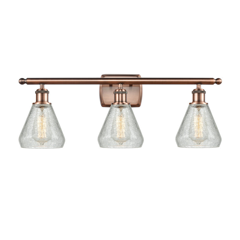 Conesus Bath Vanity Light shown in the Antique Copper finish with a Clear Crackle shade