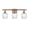 Salina Bath Vanity Light shown in the Antique Copper finish with a Clear Spiral Fluted shade