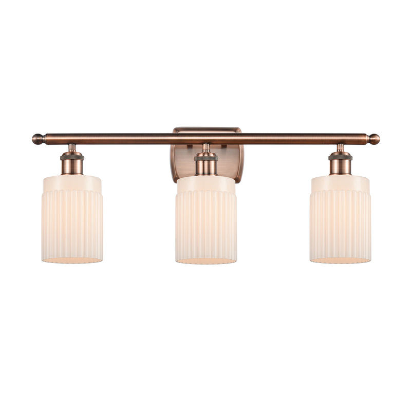 Hadley Bath Vanity Light shown in the Antique Copper finish with a Matte White shade