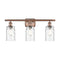Candor Bath Vanity Light shown in the Antique Copper finish with a Clear Waterglass shade
