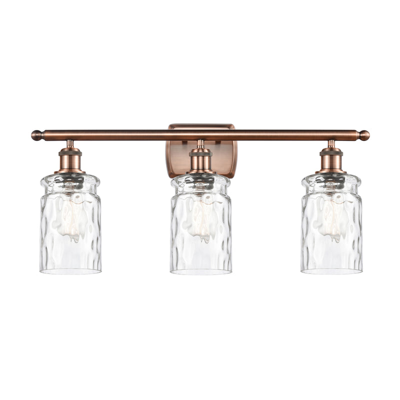Candor Bath Vanity Light shown in the Antique Copper finish with a Clear Waterglass shade
