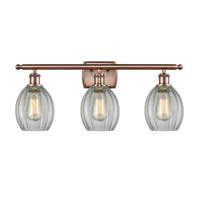 Eaton Bath Vanity Light shown in the Antique Copper finish with a Clear shade