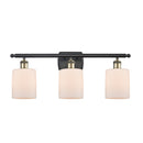 Cobbleskill Bath Vanity Light shown in the Black Antique Brass finish with a Matte White shade