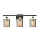 Cobbleskill Bath Vanity Light shown in the Black Antique Brass finish with a Mercury shade