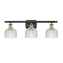 Dayton Bath Vanity Light shown in the Black Antique Brass finish with a Clear shade