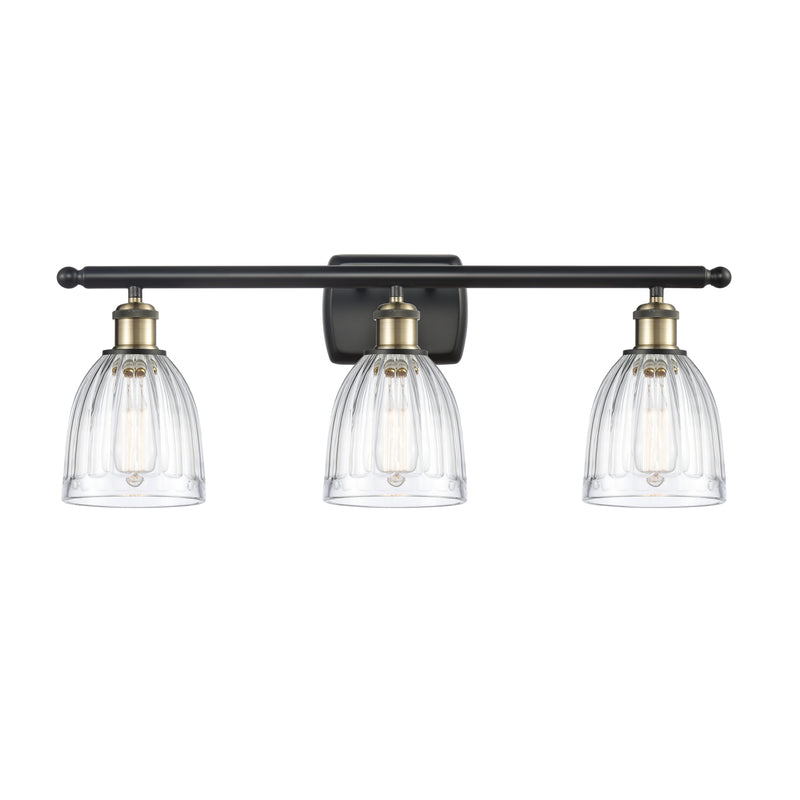 Brookfield Bath Vanity Light shown in the Black Antique Brass finish with a Clear shade