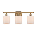 Cobbleskill Bath Vanity Light shown in the Brushed Brass finish with a Matte White shade