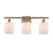 Cobbleskill Bath Vanity Light shown in the Brushed Brass finish with a Matte White shade