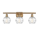 Deco Swirl Bath Vanity Light shown in the Brushed Brass finish with a Clear shade