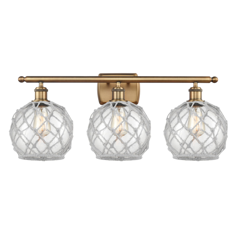Farmhouse Rope Bath Vanity Light shown in the Brushed Brass finish with a Clear Glass with White Rope shade