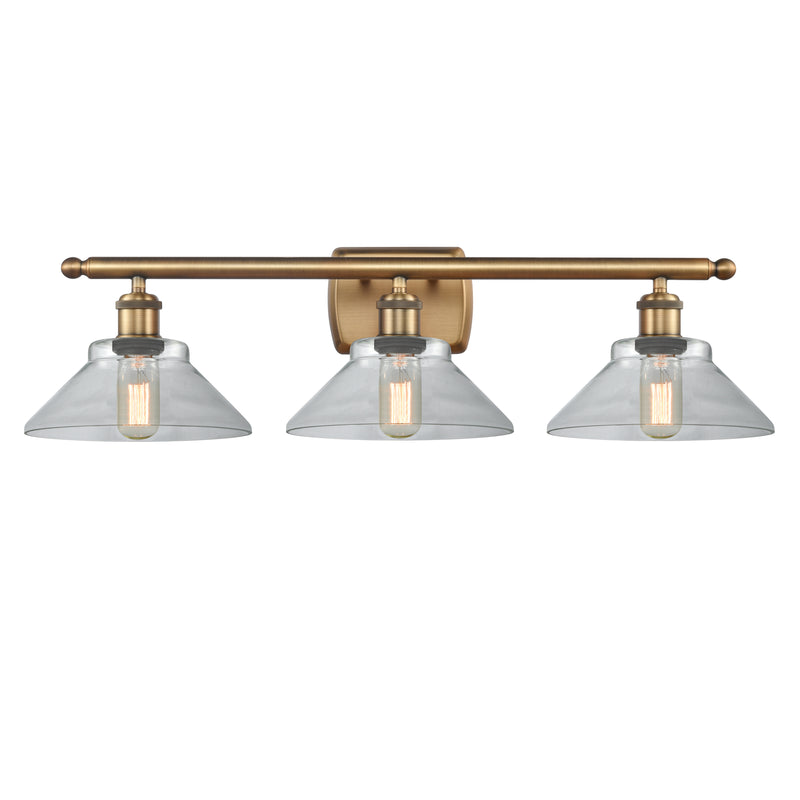 Orwell Bath Vanity Light shown in the Brushed Brass finish with a Clear shade