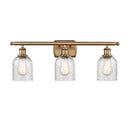 Caledonia Bath Vanity Light shown in the Brushed Brass finish with a Mica shade