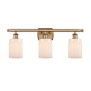 Hadley Bath Vanity Light shown in the Brushed Brass finish with a Matte White shade