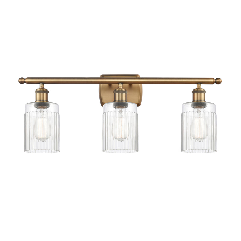 Hadley Bath Vanity Light shown in the Brushed Brass finish with a Clear shade