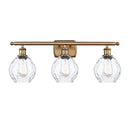 Waverly Bath Vanity Light shown in the Brushed Brass finish with a Clear shade