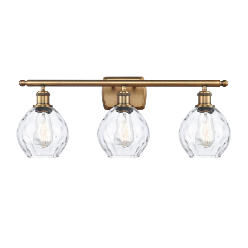 Waverly Bath Vanity Light shown in the Brushed Brass finish with a Clear shade