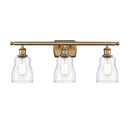 Ellery Bath Vanity Light shown in the Brushed Brass finish with a Clear shade