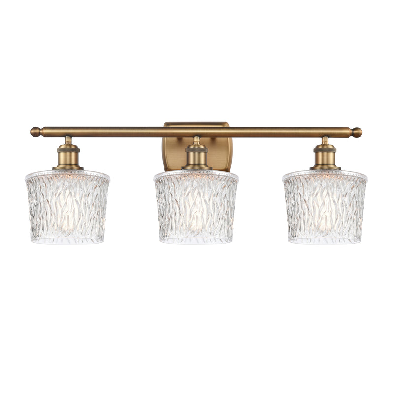 Niagra Bath Vanity Light shown in the Brushed Brass finish with a Clear shade