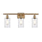 Clymer Bath Vanity Light shown in the Brushed Brass finish with a Clear shade