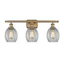 Eaton Bath Vanity Light shown in the Brushed Brass finish with a Clear shade