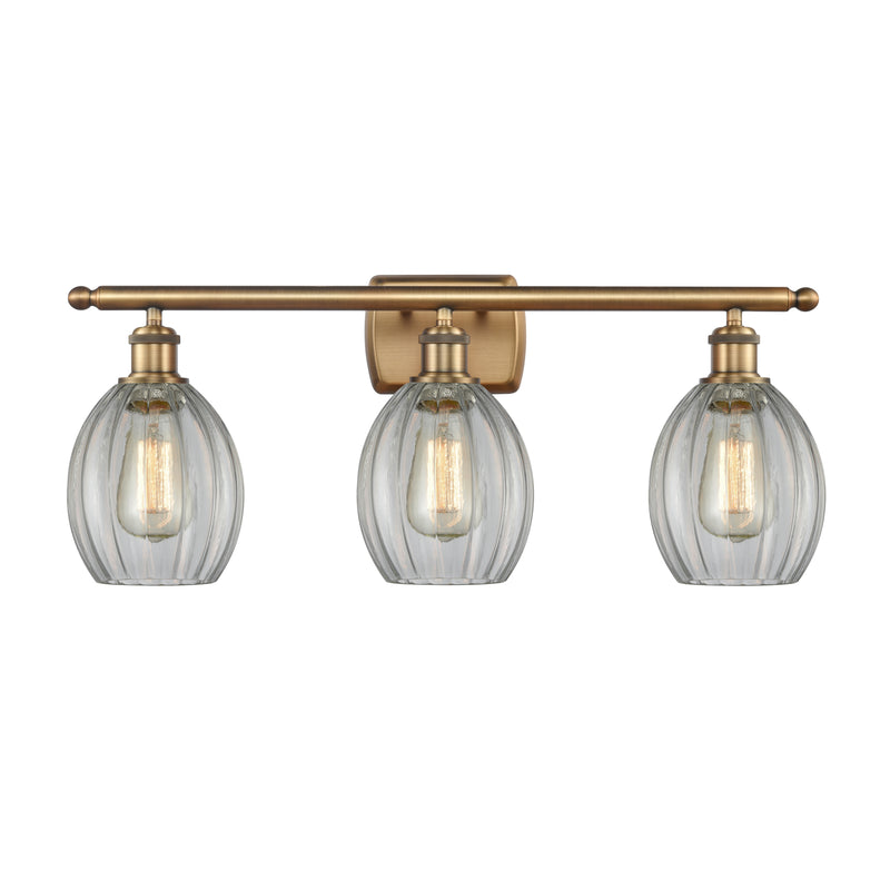 Eaton Bath Vanity Light shown in the Brushed Brass finish with a Clear shade