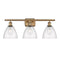 Ballston Dome Bath Vanity Light shown in the Brushed Brass finish with a Seedy shade