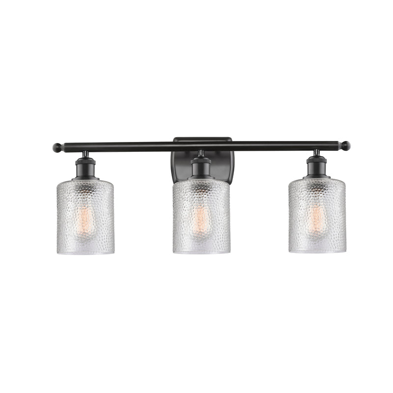 Cobbleskill Bath Vanity Light shown in the Matte Black finish with a Clear shade