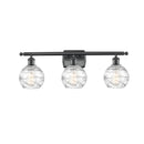 Deco Swirl Bath Vanity Light shown in the Matte Black finish with a Clear shade