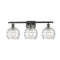 Deco Swirl Bath Vanity Light shown in the Oil Rubbed Bronze finish with a Clear shade