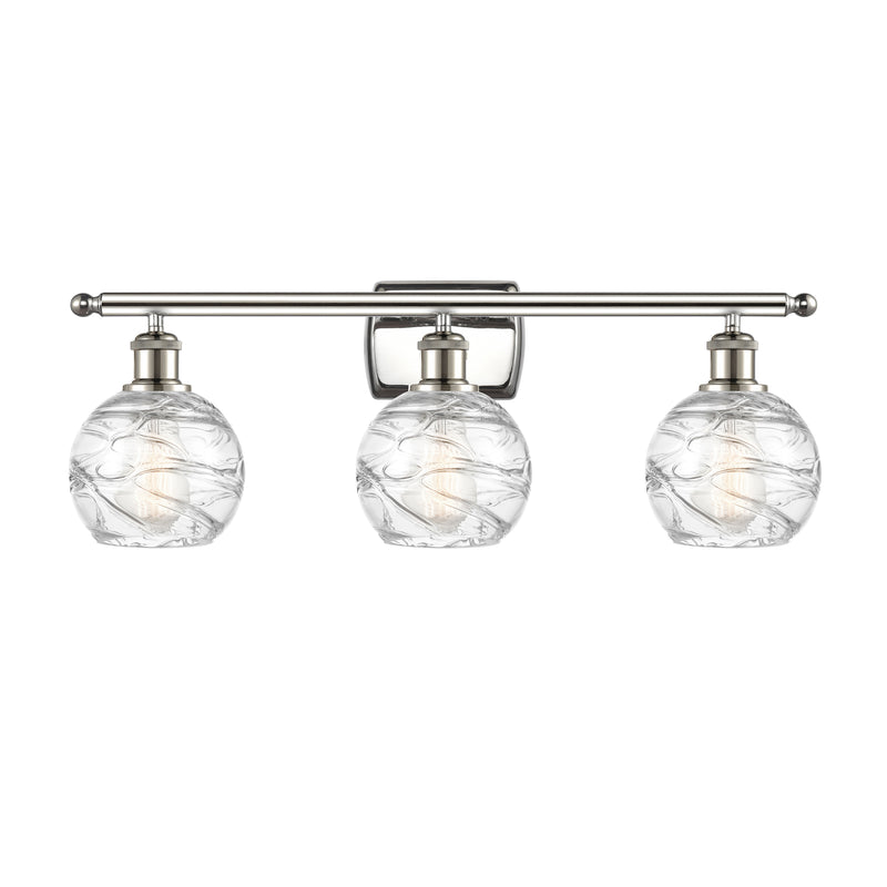 Deco Swirl Bath Vanity Light shown in the Polished Nickel finish with a Clear shade