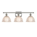 Arietta Bath Vanity Light shown in the Polished Nickel finish with a Clear shade