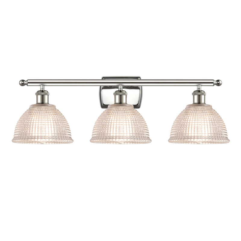 Arietta Bath Vanity Light shown in the Polished Nickel finish with a Clear shade